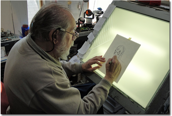 John Fantucchio draws his "Mysterious Character" in his studio