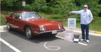 John Fantucchio with his red 1963 Studebaker Avanti on June 5th 2010.